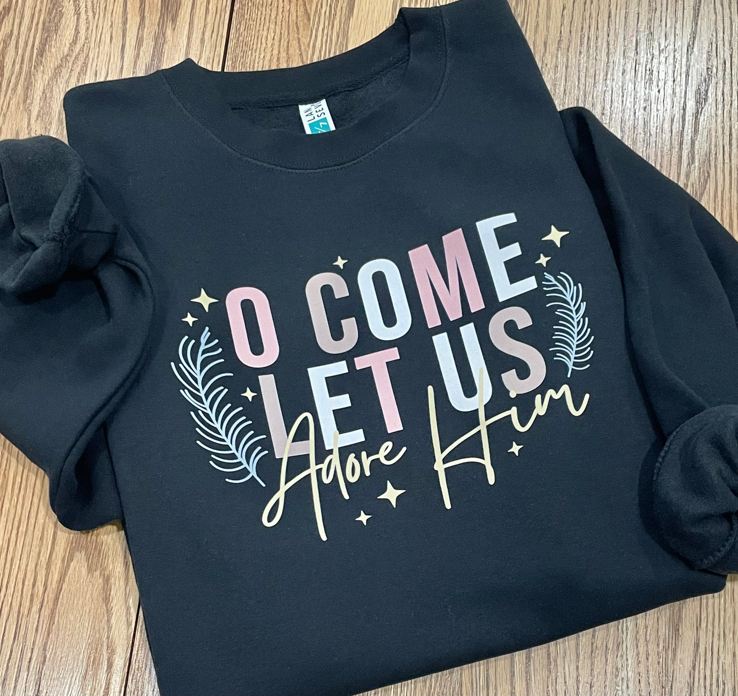 O Come Let Us Adore Him Lane Seven® Premium Crewneck Sweatshirt